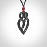 This is a hand carved love heart pendant made from a gorgeous and striking piece of Black Jade stone. This is a superbly carved and very unique piece if custom jewellery. For sale online from NZ Pacific.